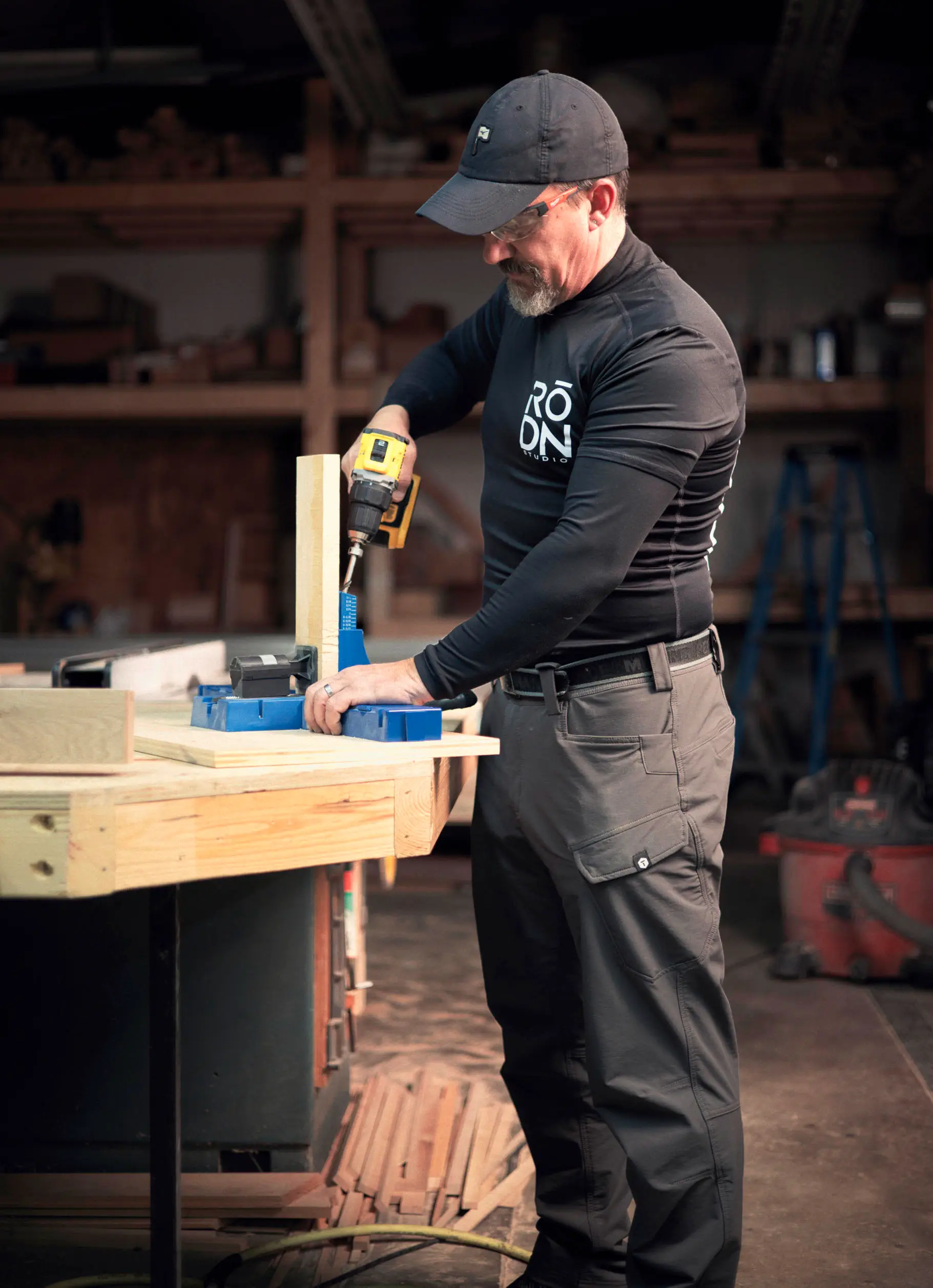 Colin working on a woodworking project in the RŌDN woodshop